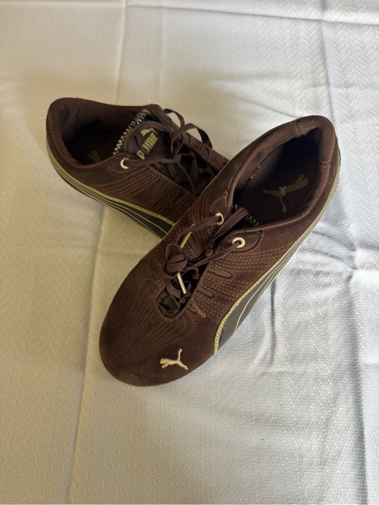 Puma Shoes - Puma Women’s Dark Brown Low-Top Sneakers with Gold Accents 6.5 US
